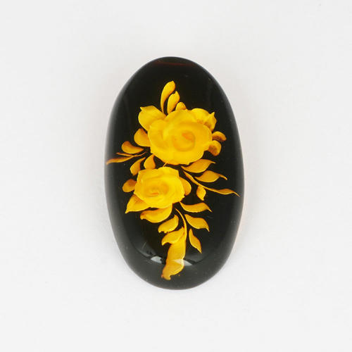 6.38 ct. Amber floral Intaglio Carving