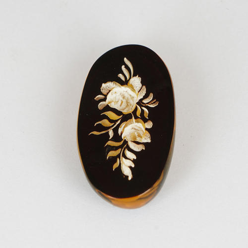 6.38 ct. Amber floral Intaglio Carving